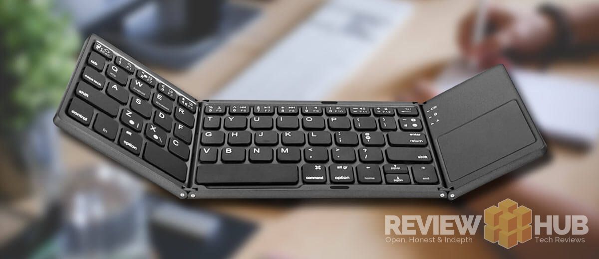 Jelly-Comb-trifold-bluetooth-keyboard-with-touchpad Jelly Comb Tri-Fold Portable Keyboard on desk